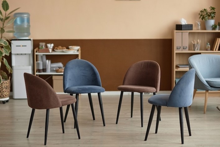 clinical psychologist's session with four chairs in circle