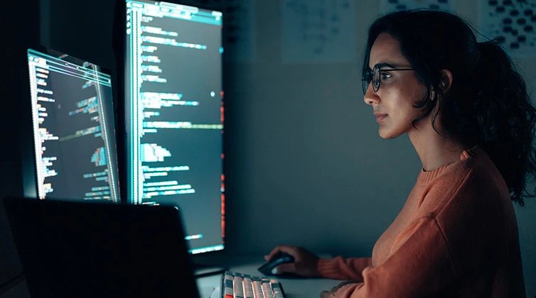 Woman looking at computer screen