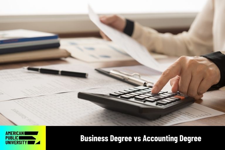 finance-vs-accounting accountant working on calculator