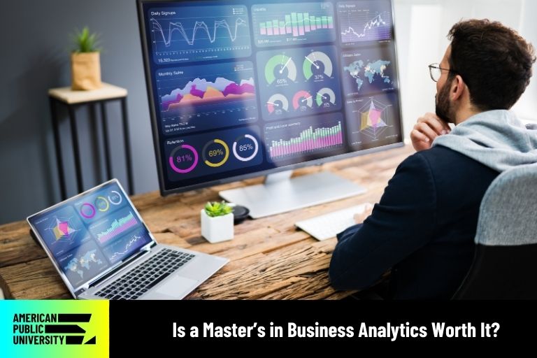 is-a-masters-in-business-analytics-worth-it Business Analytics student looking at data