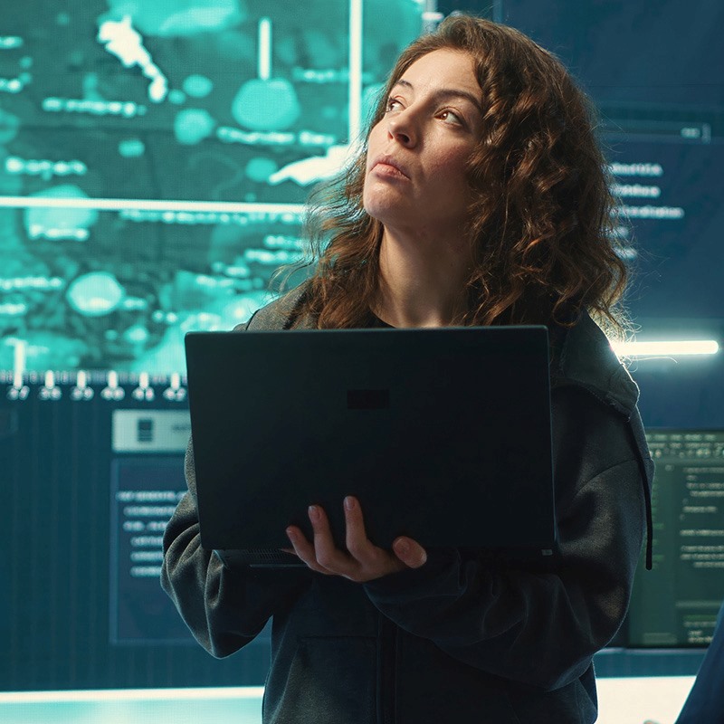 space studies student holding laptop