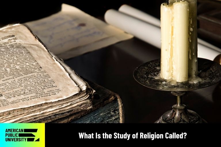 religious book next to wax candle