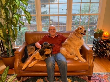 Jim relaxing with his dogs Donut and Chili.