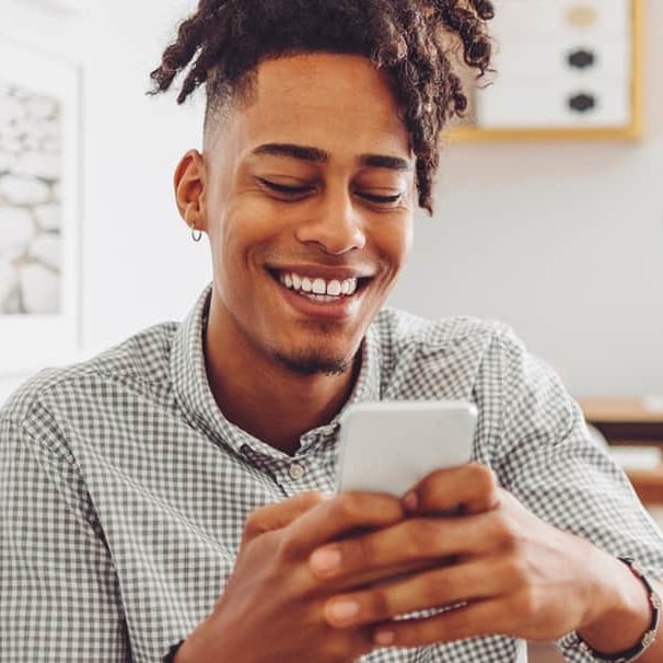 man looking at phone