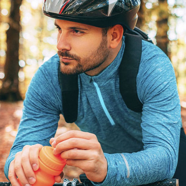 Photo of a man riding a bike